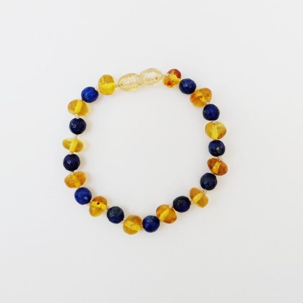 Pulsera artesanal de ámbar miel con lapislazuli.